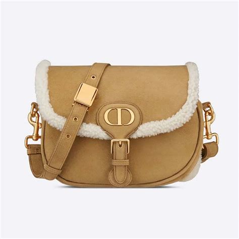 dior saddle camel|Dior camel shearling bag.